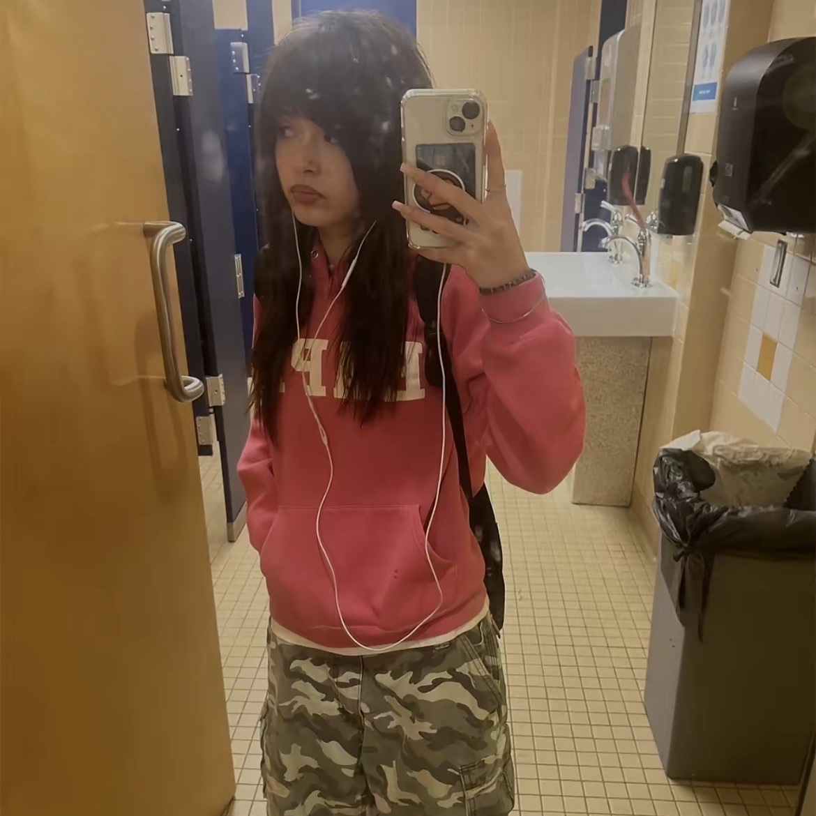 pink hoodie, bad lighting, still cute though.
